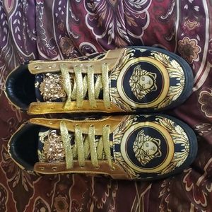 Men black and gold shoes